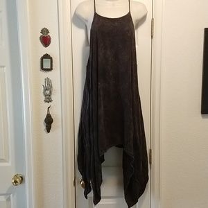 Asymmetrical sundress with pockets.